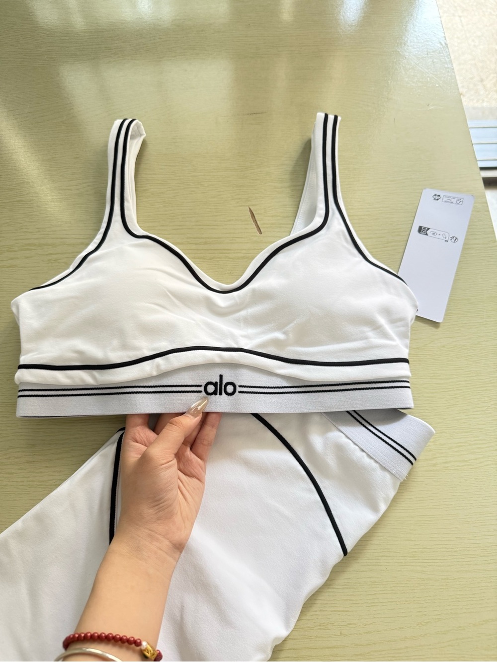 ALO Yoga White Sports Bra & Matching Shorts with Black Seam Detail - Picture 5 of 6